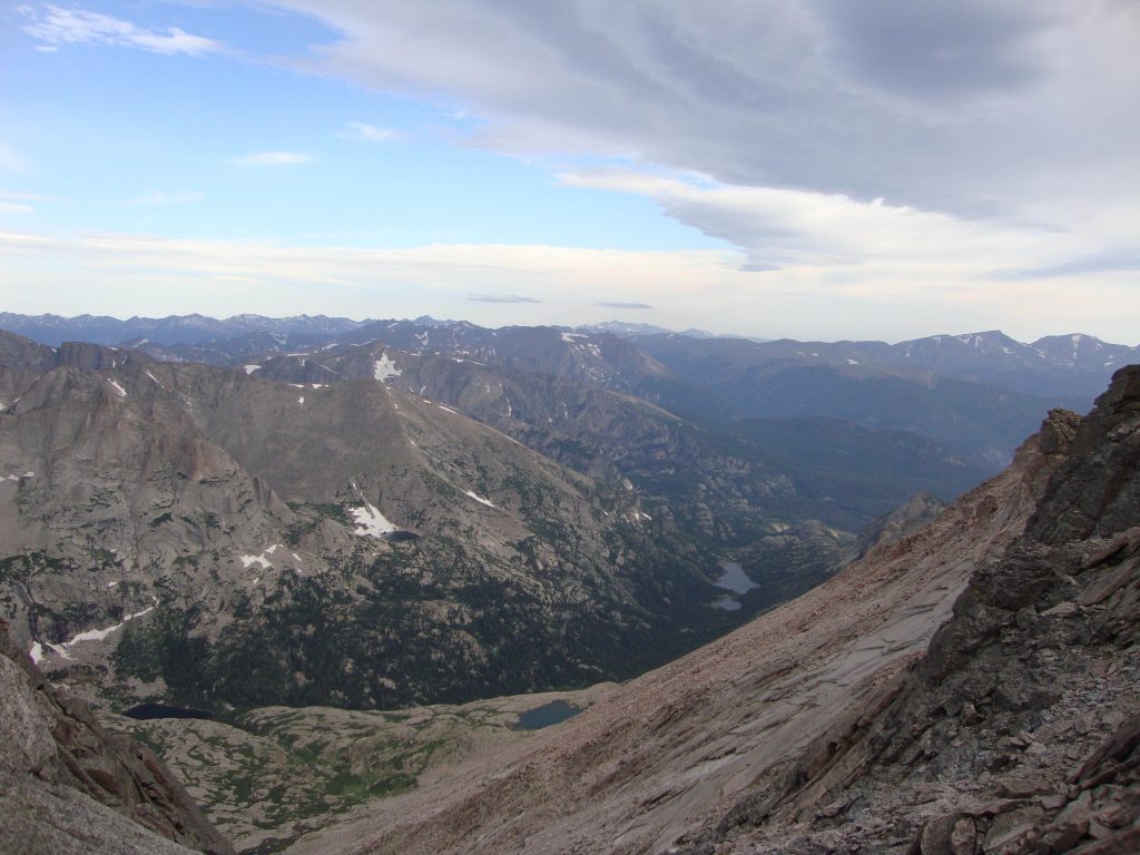 A mountain range in Colorado with small patches of snow still visible.