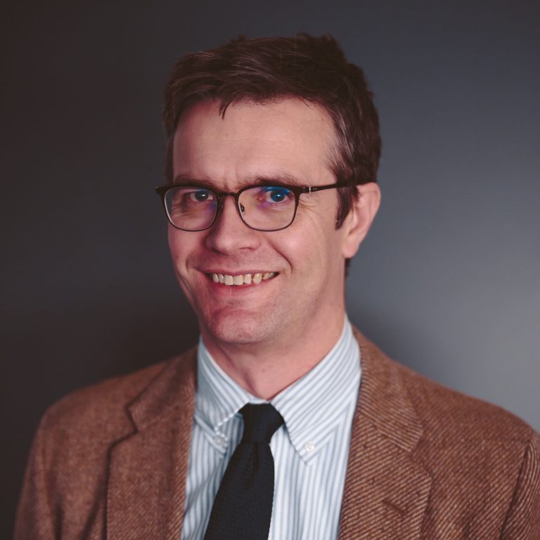 A portrait of Associate Professor Clayton Shonkwiler.